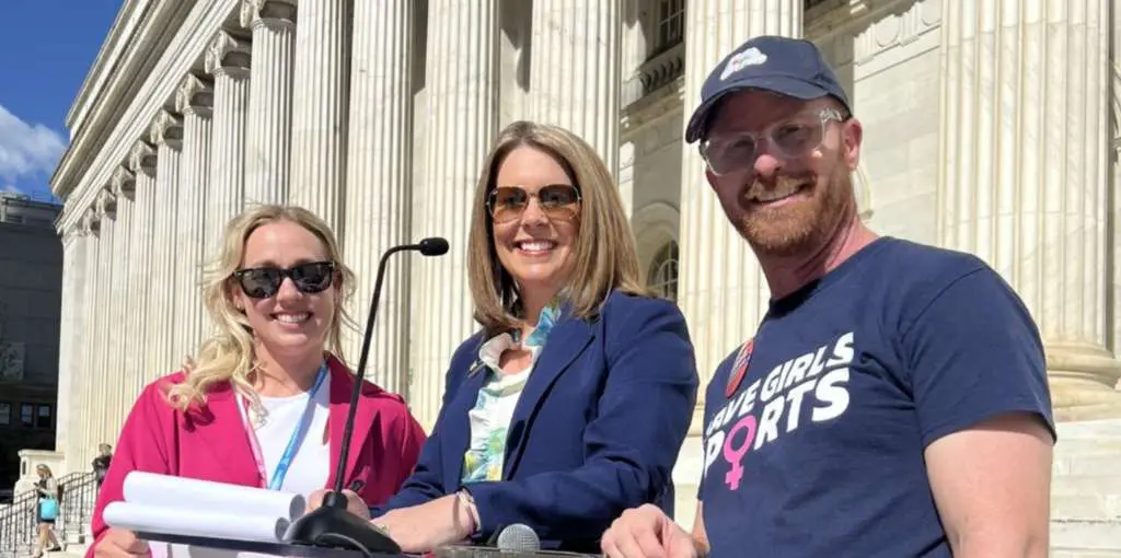 state Rep. Brandi Bradley poses with anti-trans activists Erin Lee & Rich Guggenheim