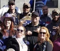 Ty Winter displays 3UP handing on west steps of Colorado Capital