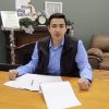 Congressman Gabe Evans signs and endorses anti-trans ballot initiatives. Photo: Evans for Congress, 1/6/26.