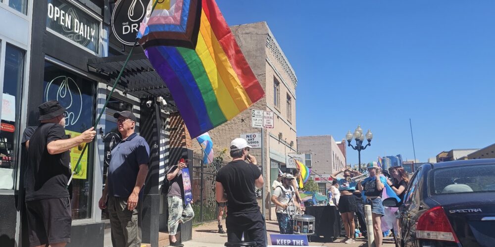 Right-wing Rally for Anti-LGBTQ Coffee Shop Draws Protesters, Brass Band
