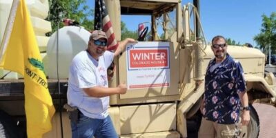 Gage Montoya and Ty Winter pose with Winter's statehouse campaign sign. Photo: Gage Montoya FB, July 21, 2022