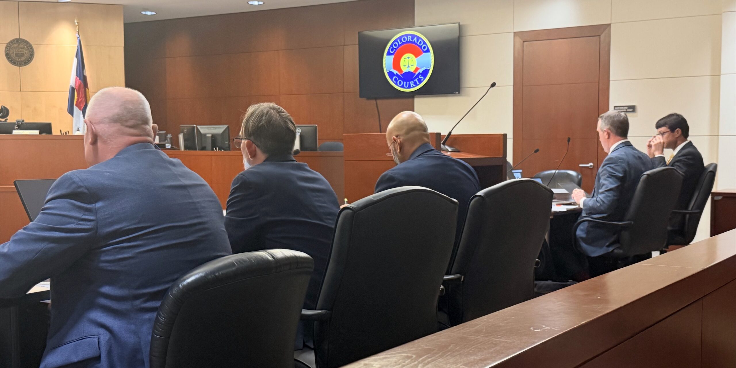 Hearing for lawsuit challenging DougCo Commissioners' rewriting of 3 to 5 ballot initiative. Photo: Suzie Glassman